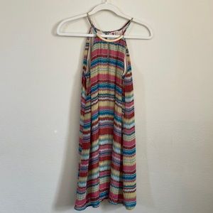 Size small multi colored dress with gold detail in front
